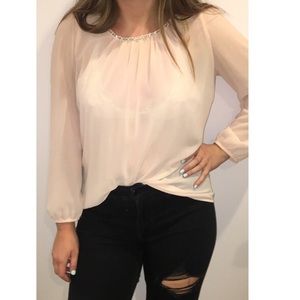 Nice blush blouse that’s see through